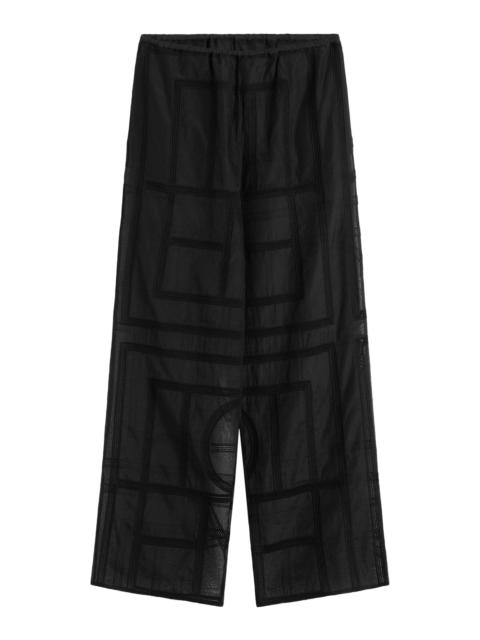 TOTEME SEMI-TRANSPARENT SILK TROUSERS WITH MONOGRAM