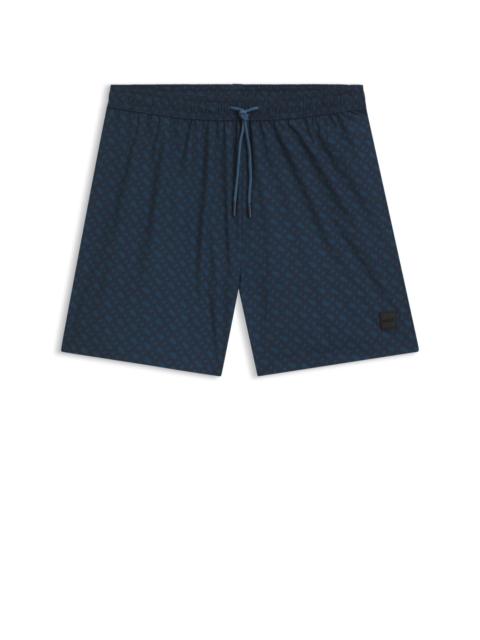 BOSS LOGO-BADGE SWIM SHORTS WITH DEGRADÉ MONOGRAM PRINT