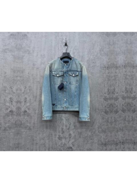 Prada Prada distressed denim jacket with triangular logo wash.