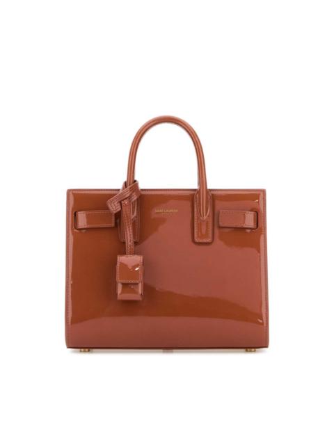 SAINT LAURENT Saint Laurent Brick Leather Nano Sac De Jour Handbag