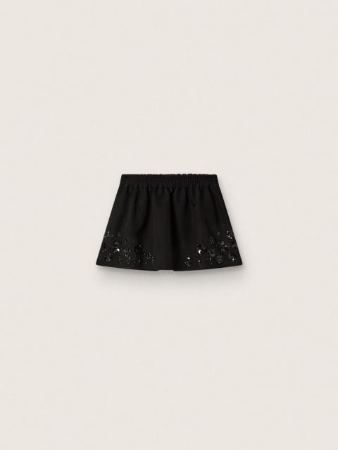 Golden Goose Women’s miniskirt in black cotton twill with floral sequin embroidery