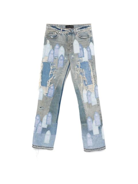 Patched Arch Repaired Blowout jeans
