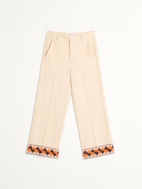 WOOL GABARDINE TROUSERS WITH JACQUARD HEM