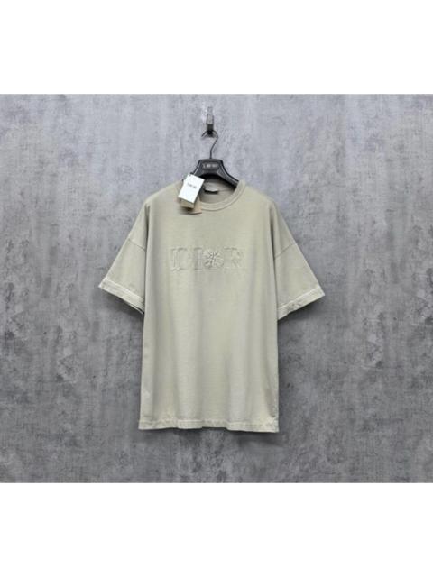 Dior Dior x Stone Island collaboration featuring a bold embroidered logo ribbon short-sleeved T-shirt