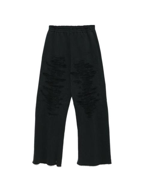 distressed track pants