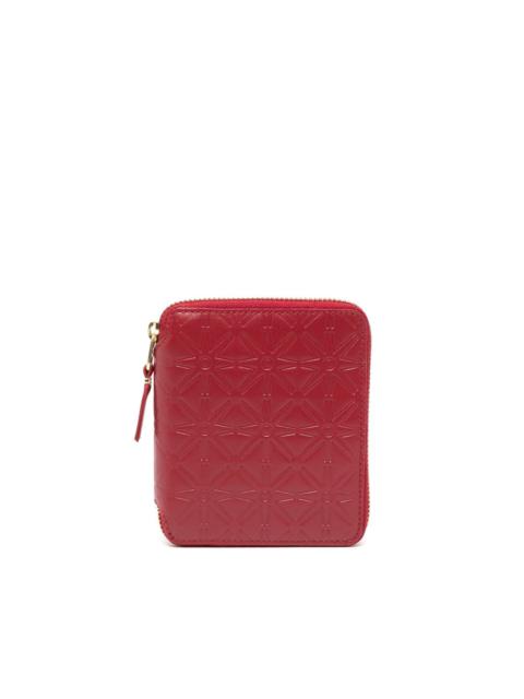 Comme Des Garçons logo-embossed leather wallet