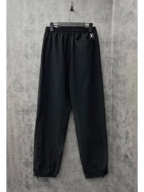 Louis Vuitton Louis Vuitton embossed iridescent logo casual trousers