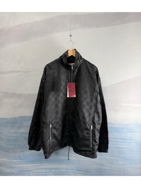 GUCCI Gucci Black Windbreaker with All-Over Tonal Pattern and Zip Closure