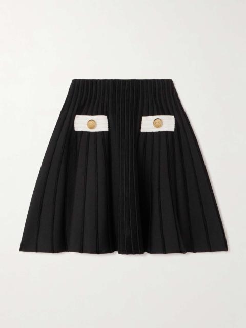 Button-embellished knitted mini skirt