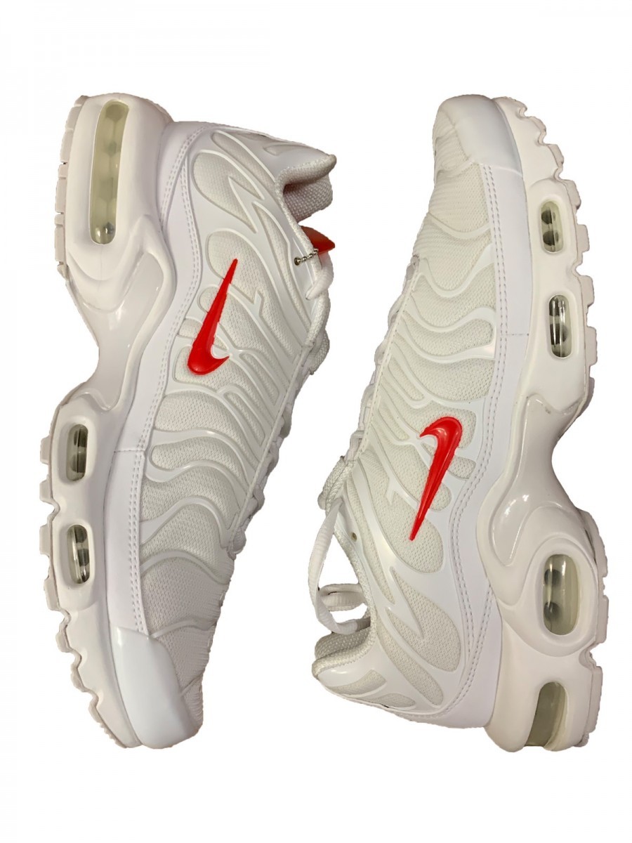 white tns with red tick