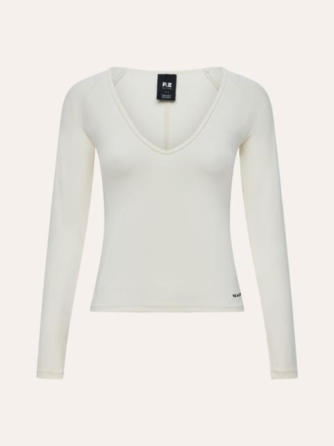 P.E NATION SIGNATURE V NECK LONG SLEEVE TOP IN WHISPER WHITE