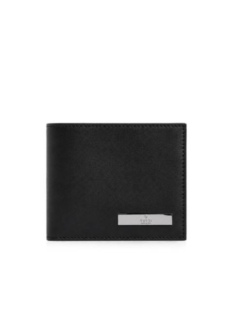 GUCCI bi-fold wallet with metal tag