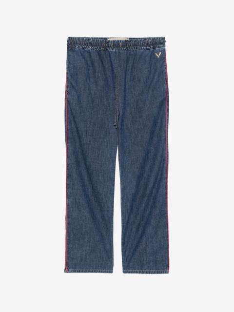 Valentino piped-trim VLogo jeans
