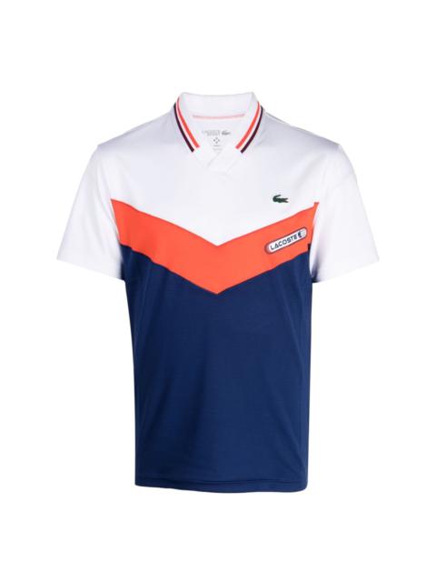 LACOSTE logo-patch panelled polo shirt