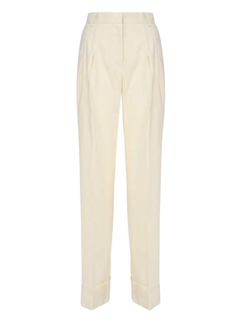 THE ANDAMANE pleated-front cuffed-hem trousers