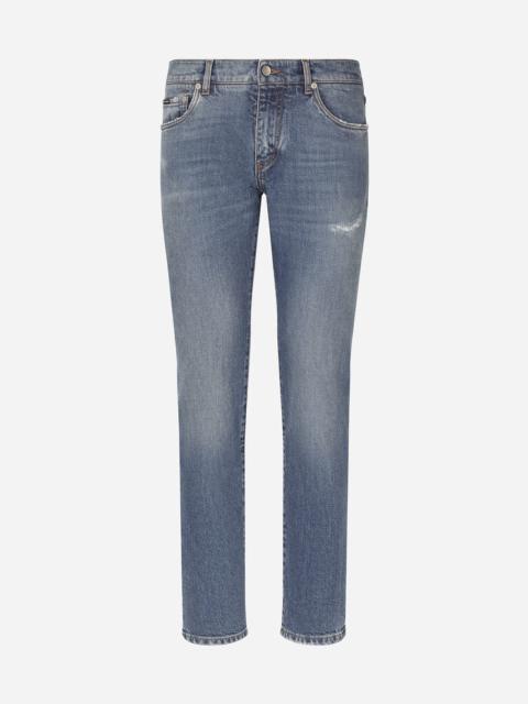 Slim fit stretch denim jeans with subtle abrasions