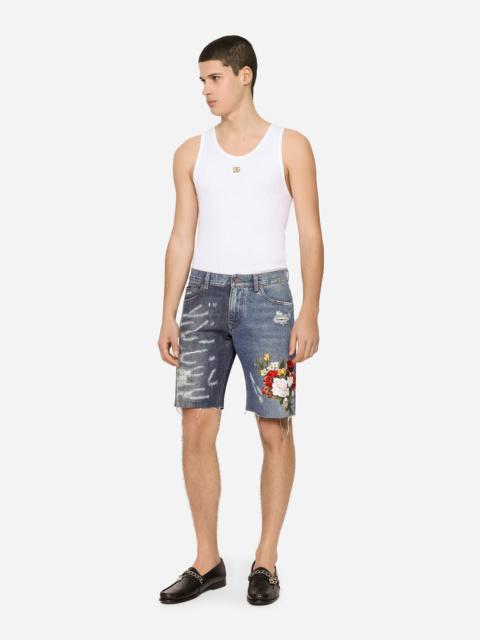 Dolce & Gabbana Blue denim shorts with rips and embroidery