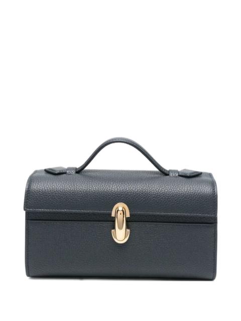 SAVETTE The Symmetry Pochette, a luxurious piece from Savette, redefines elegance in the world of bags. Craf
