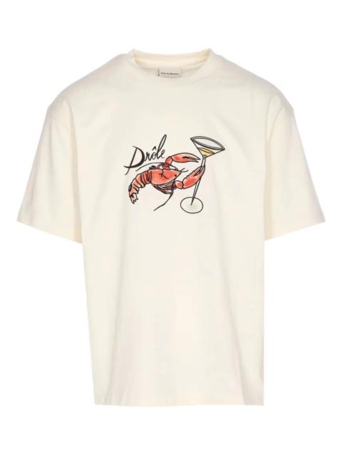 Drôle de Monsieur Introducing the 'LE T-SHIRT HOMARD' T-SHIRT from the renowned brand DROLE DE MONSIEUR, a quintessent