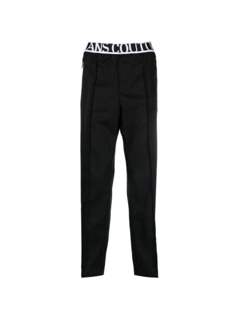 VERSACE JEANS COUTURE logo-waistband pleat-detail trousers