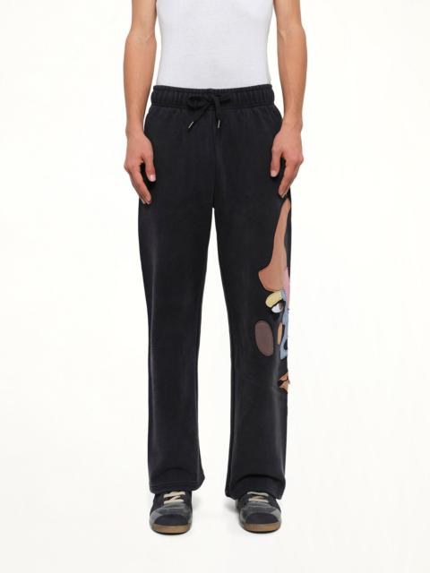 KidSuper Side Eye Face Sweatpants in Black