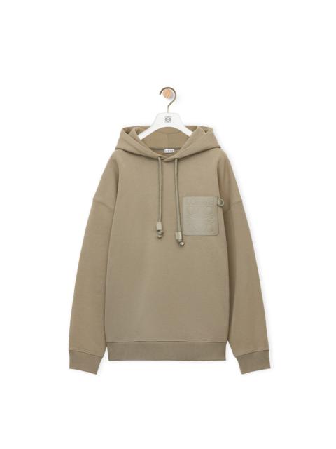 Anagram patch pocket hoodie in cotton