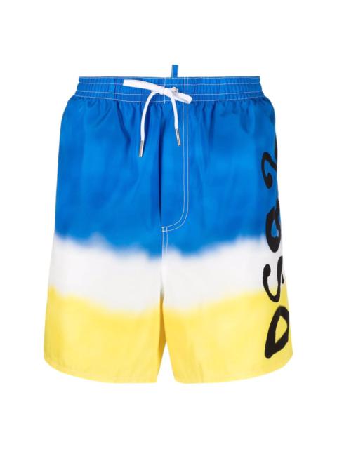 spray-paint print swim shorts