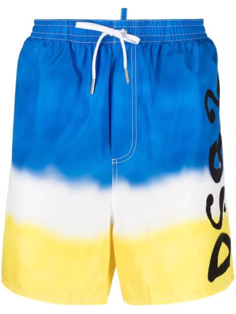 spray-paint print swim shorts