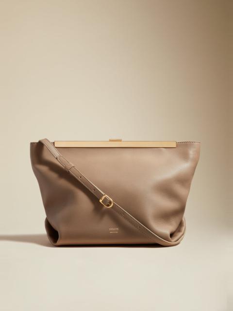 KHAITE The Augusta Crossbody Bag in Taupe Pebbled Leather