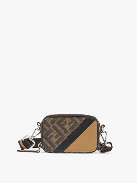FENDI Compact mini pouch with zip fastening. The cross-body strap is adjustable and detachable. Made of te