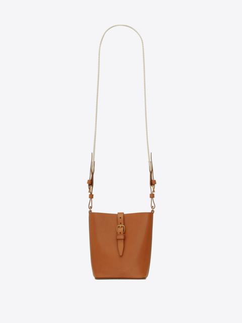 SAINT LAURENT mini bucket bag in vegetable-tanned leather
