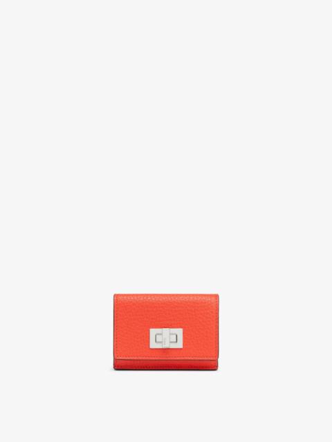 FENDI Compact, tri-fold Peekaboo wallet with large internal bill compartment and three concealed card hold