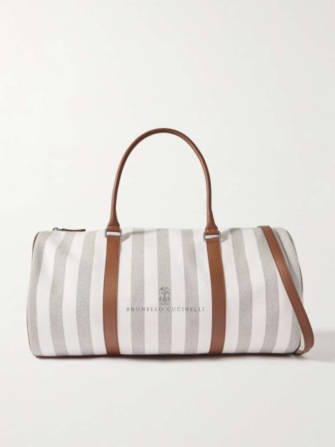 Brunello Cucinelli Leather-trimmed striped canvas duffel bag