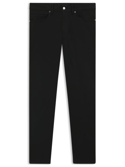 BOSS PORSCHE X BOSS TAPERED-FIT JEANS IN BLACK STRETCH DENIM