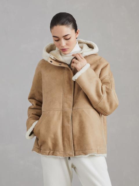 Curly shearling reversible hooded outerwear jacket with monili