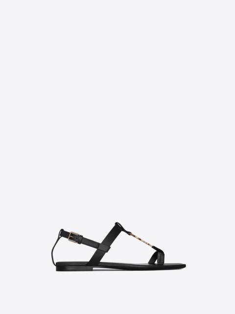 SAINT LAURENT cassandra flat sandals in smooth leather with gold-tone monogram
