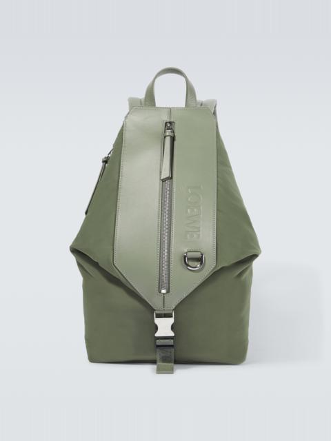 Convertible leather-trimmed backpack