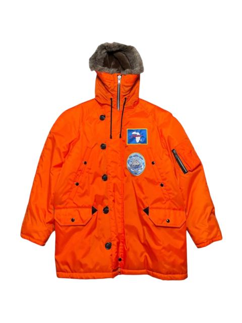 DENIM TEARS Longest Trip Patch Parka Jacket "Orange" DT610