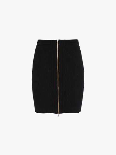 Short black knit high-waisted skirt