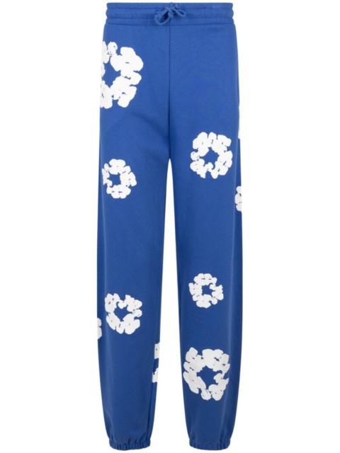 DENIM TEARS wreath-print track pants
