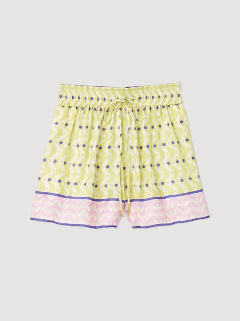 Sandro Loose printed star shorts