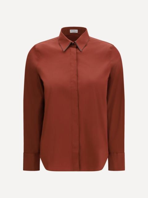 Shirt with iconic jewelry details