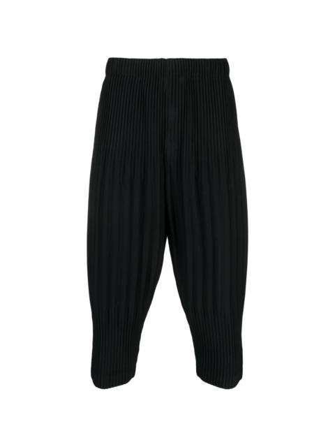 ISSEY MIYAKE pleated tapered cropped trousers