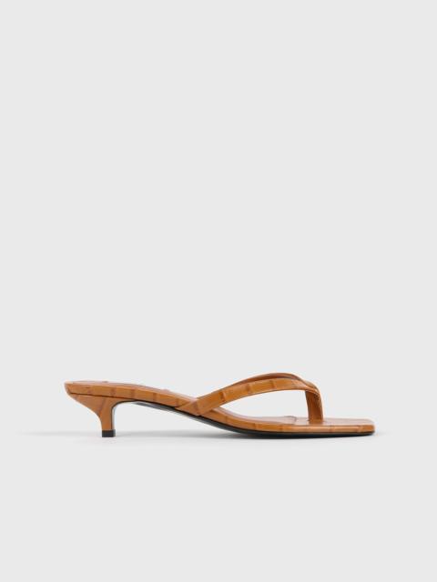 TOTEME Croco-embossed heeled flip flops tangerine