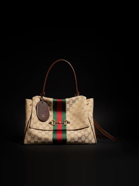 GUCCI Paparazzo medium top handle bag
