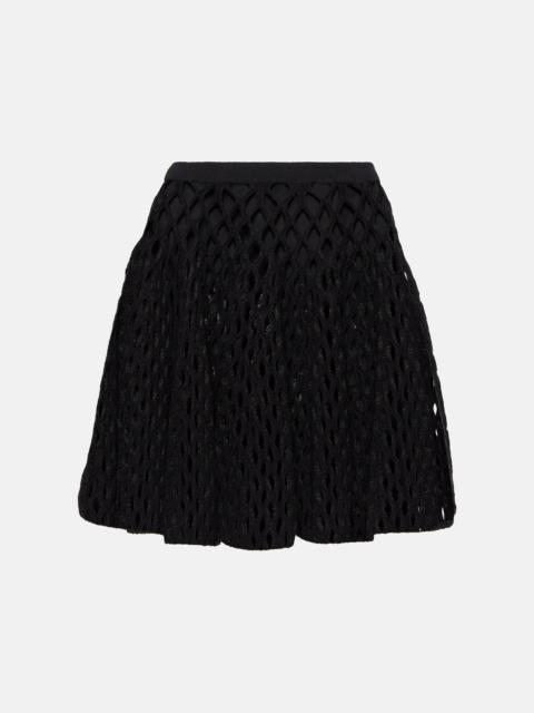 High-rise wool-blend open-knit miniskirt