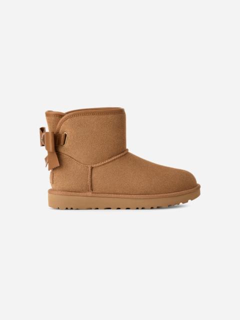 UGG ® Women's Ultra Mini Bailey Leather Bow Suede Classic Boots in Chestnut