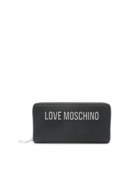 Moschino logo-lettering zipped wallet