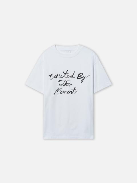 John Elliott JOHN ELLIOTT UNITED BY THE MOMENT TEE