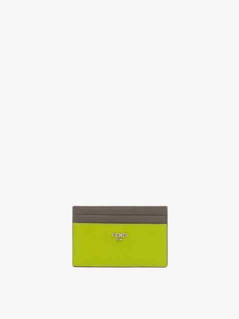 FENDI Card holder made of acid green leather with FF motif. Gray leather details. Palladium metal FENDI RO